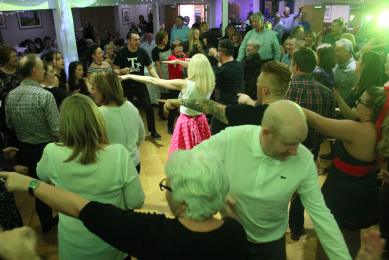 Rock n Roll tribute act teaching a packed dancefloor some moves